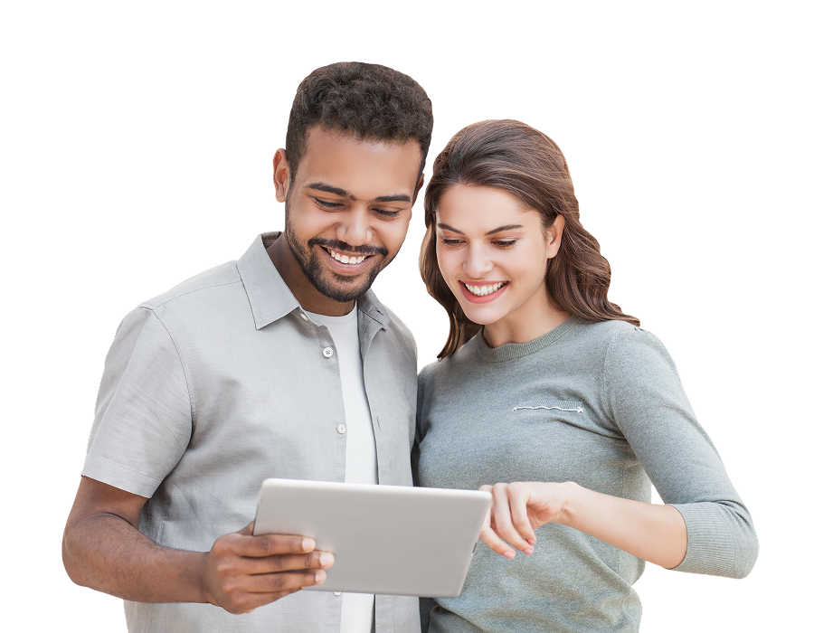 Happy couple looking at tablet